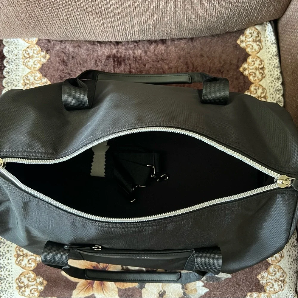 MICHAEL KORS Black Barrel Nylon Detachable Strap Silver-Tone Hardware Duffle Bag